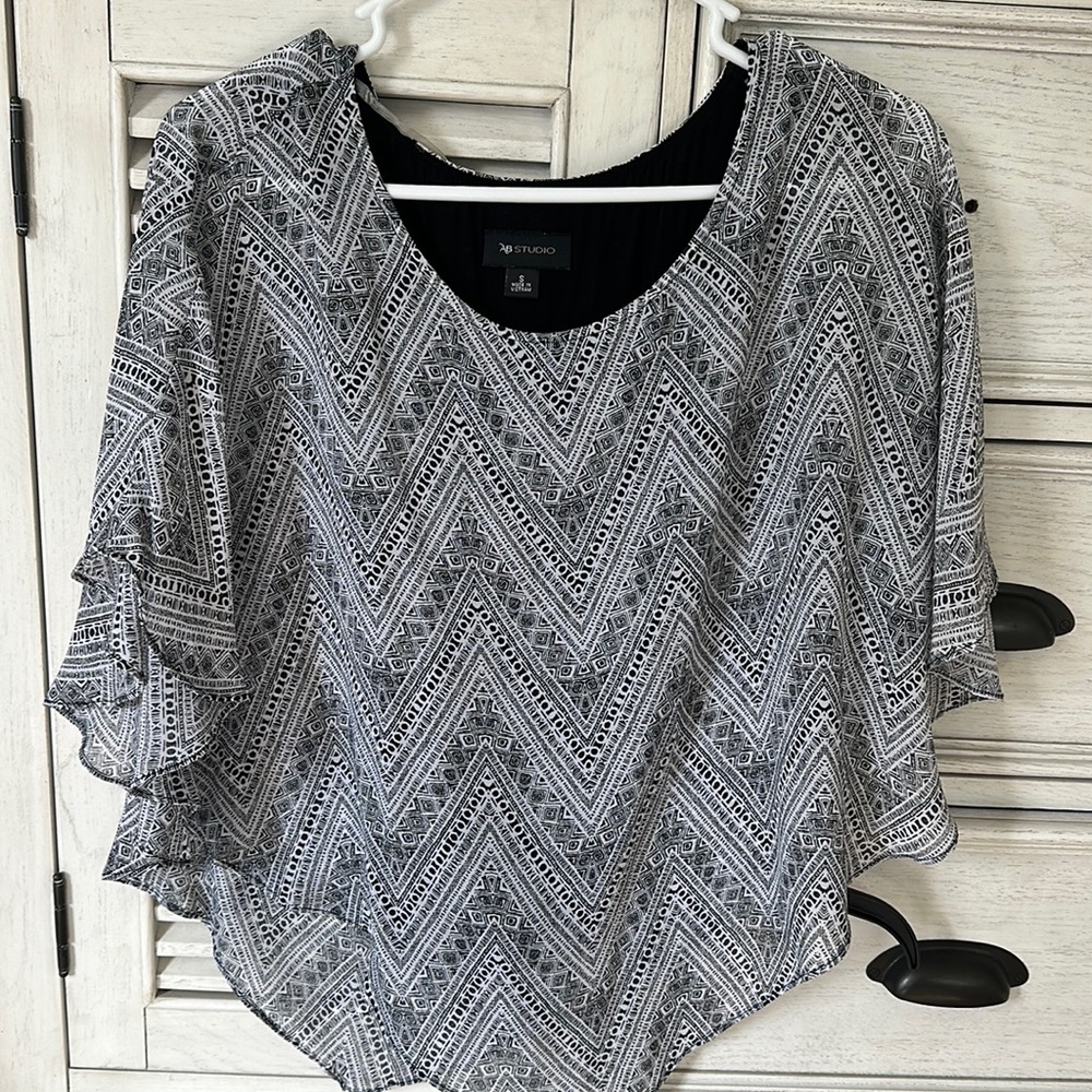 AB Studio 2 piece top with tank underneath